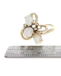 Oval Opal and Diamond Accent Ring in Yellow Gold