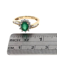 Oval Emerald and Diamond Halo Accent Ring in White and Yellow Gold