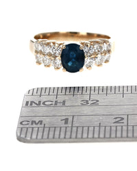 Blue Sapphire and Diamond Accent Ring in Yellow Gold