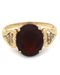 Garnet and Diamond Accent Ring in Yellow Gold