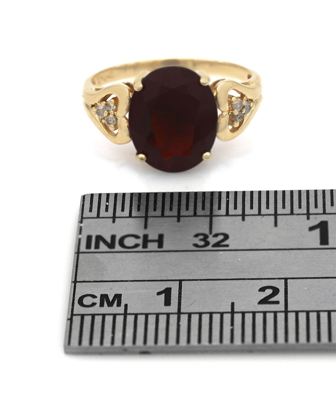 Garnet and Diamond Accent Ring in Yellow Gold