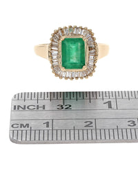 Emerald and Diamond Halo Ring in Yellow Gold