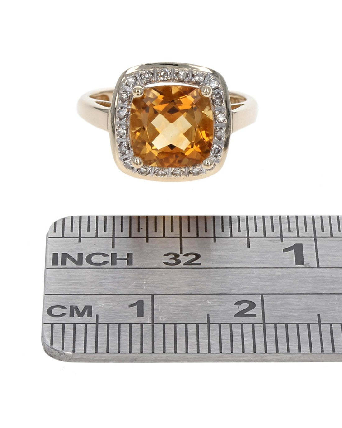 Citrine and Diamond Halo Ring in Yellow Gold