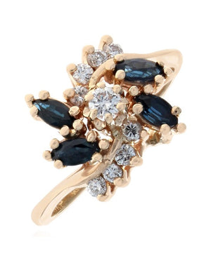 Dark Blue Sapphire and Diamond Bypass Ring in Yellow Gold