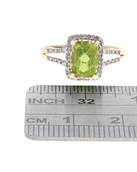 Peridot and Diamond Halo Ring in Yellow Gold