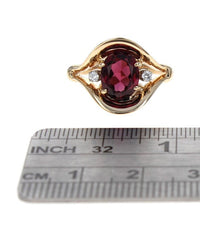 Garnet and Diamond Accent Ring in Yellow Gold