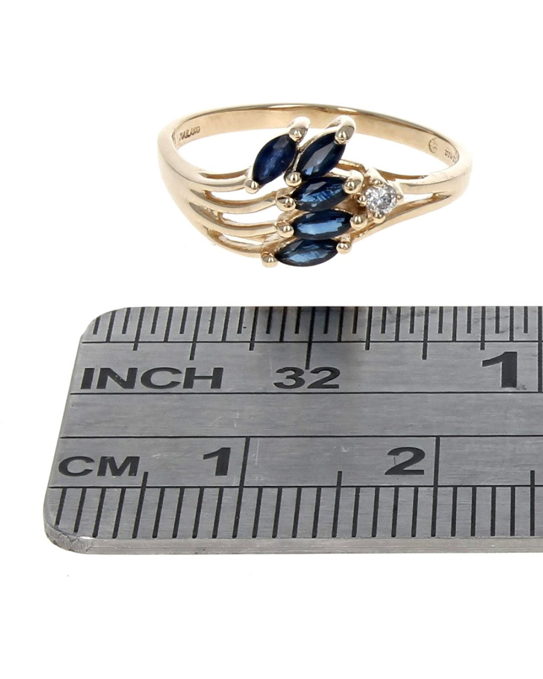 Blue Sapphire and Diamond Accent Wave Ring in Yellow Gold