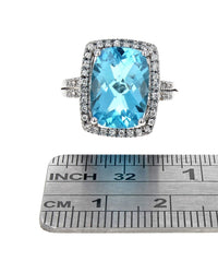 Blue Topaz and Diamond Halo Ring in White Gold