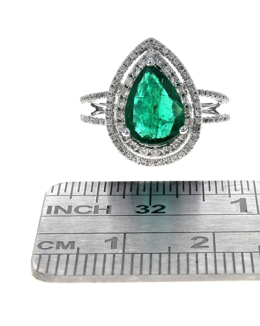 Pear Shaped Emerald and Diamond Double Halo Ring