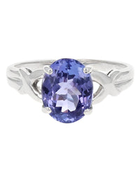 Tanzanite Solitaire Crossover Split Shank Ring in White Gold