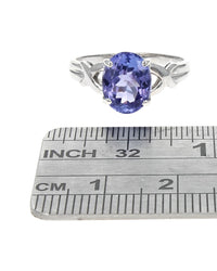 Tanzanite Solitaire Crossover Split Shank Ring in White Gold