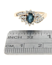 Blue Sapphire and Diamond Halo Bypass Ring in Yellow Gold