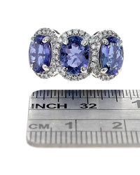 3 Station Tanzanite and Diamond Halo Ring