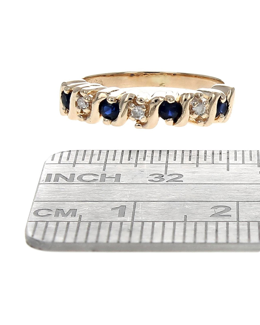 Alternating Blue Sapphire and Diamond S Curve Ring in Yellow Gold