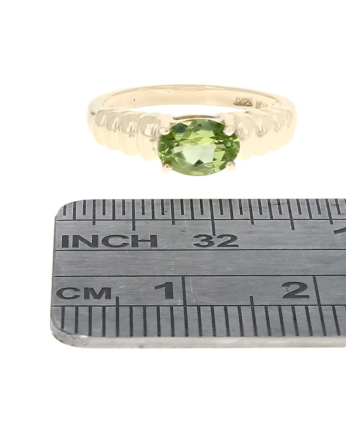 Peridot Solitaire Ribbed Ring in Yellow Gold