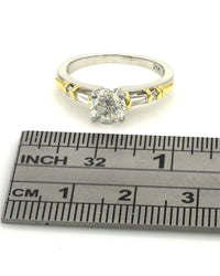Round Brilliant Diamond Solitaire Baguette and Round Diamond Accent Ring