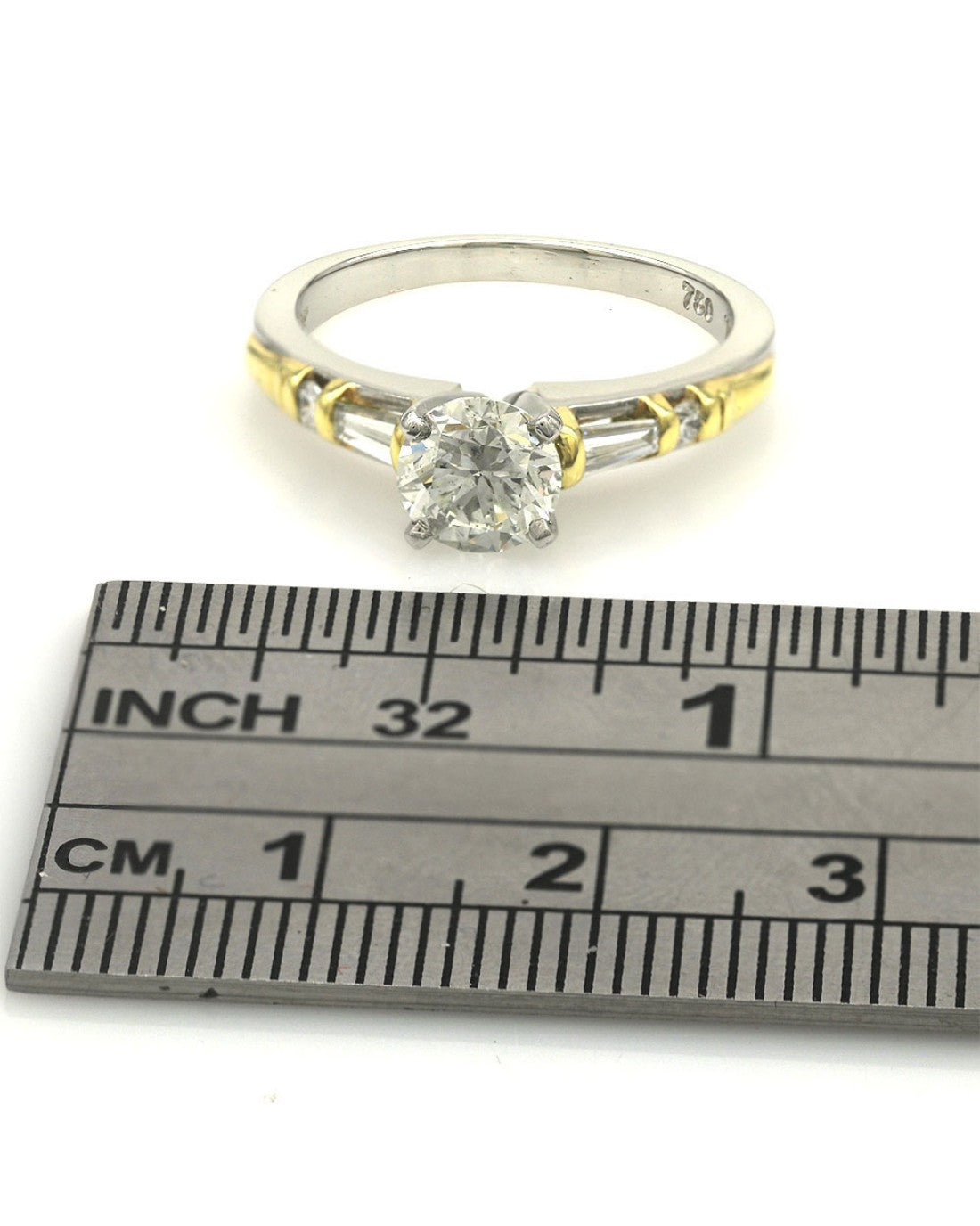 Round Brilliant Diamond Solitaire Baguette and Round Diamond Accent Ring