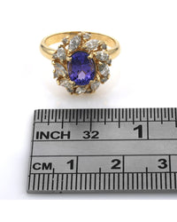 Oval Tanzanite Mixed Cut Diamond Halo Ring