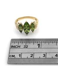 3 Stone Peridot Ring in Yellow Gold