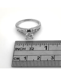 Round Brilliant Diamond Solitaire Engagement Ring with Diamond Accent
