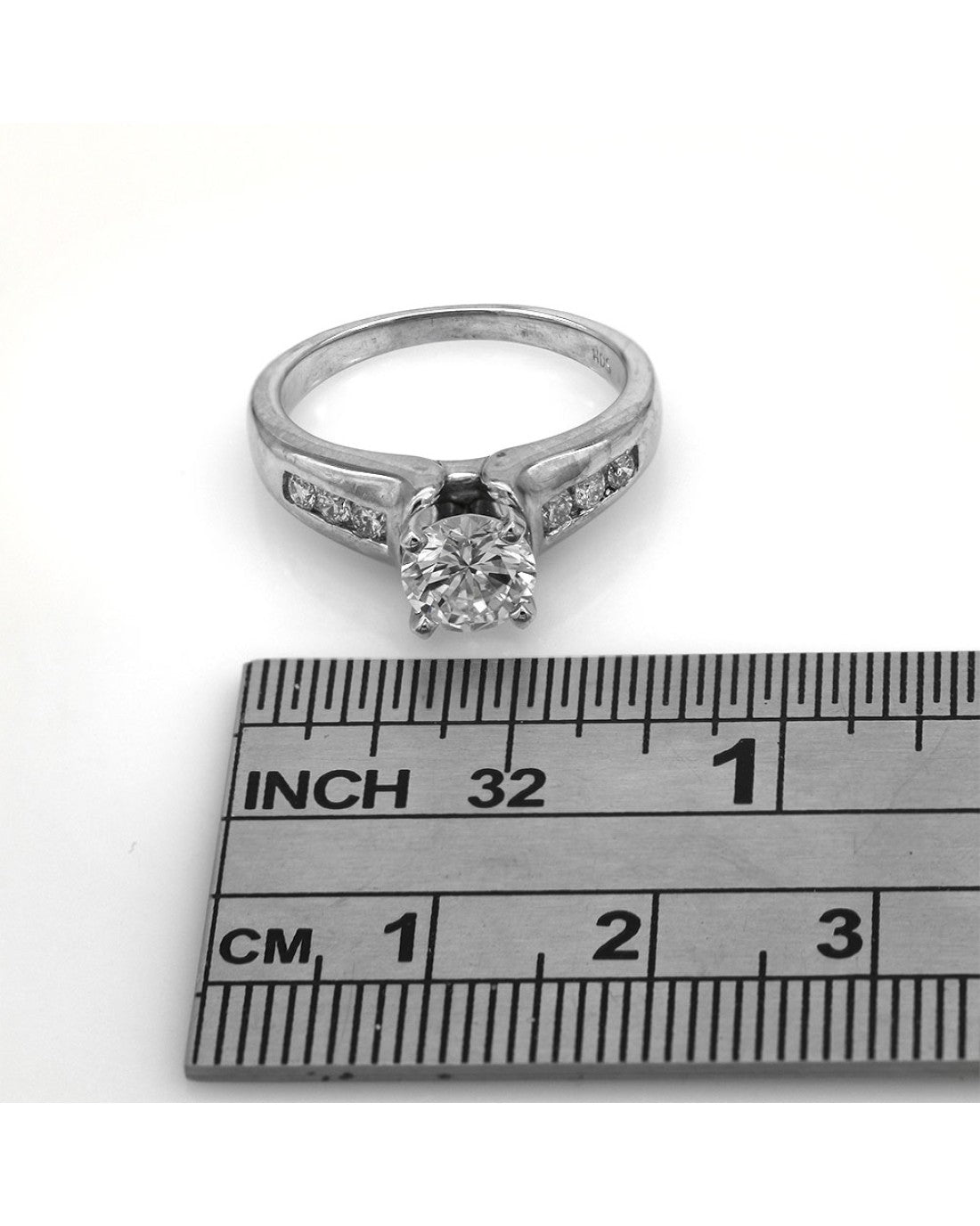 Round Brilliant Diamond Solitaire Engagement Ring with Diamond Accent