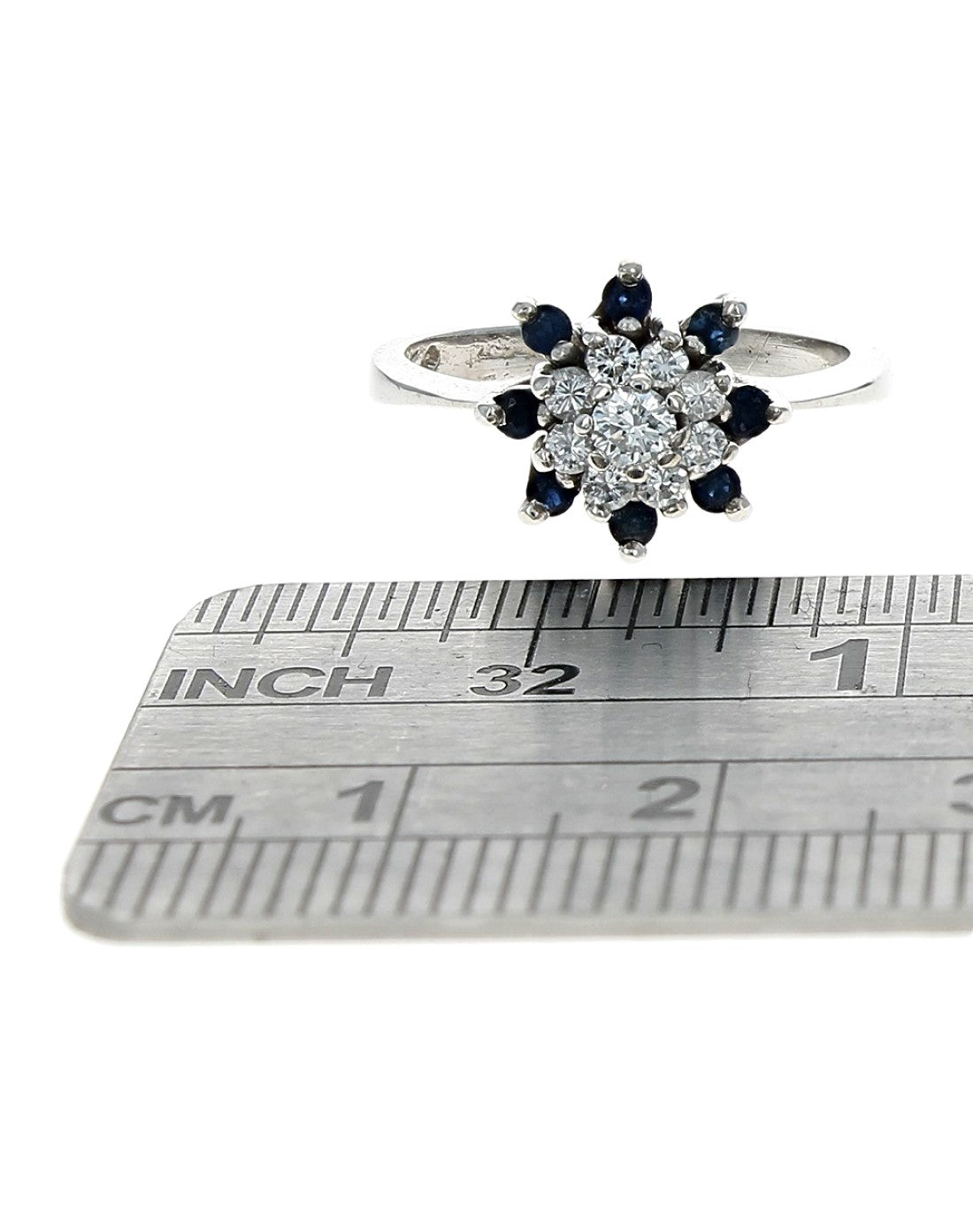 Diamond and Sapphire Halo Ring in Gold