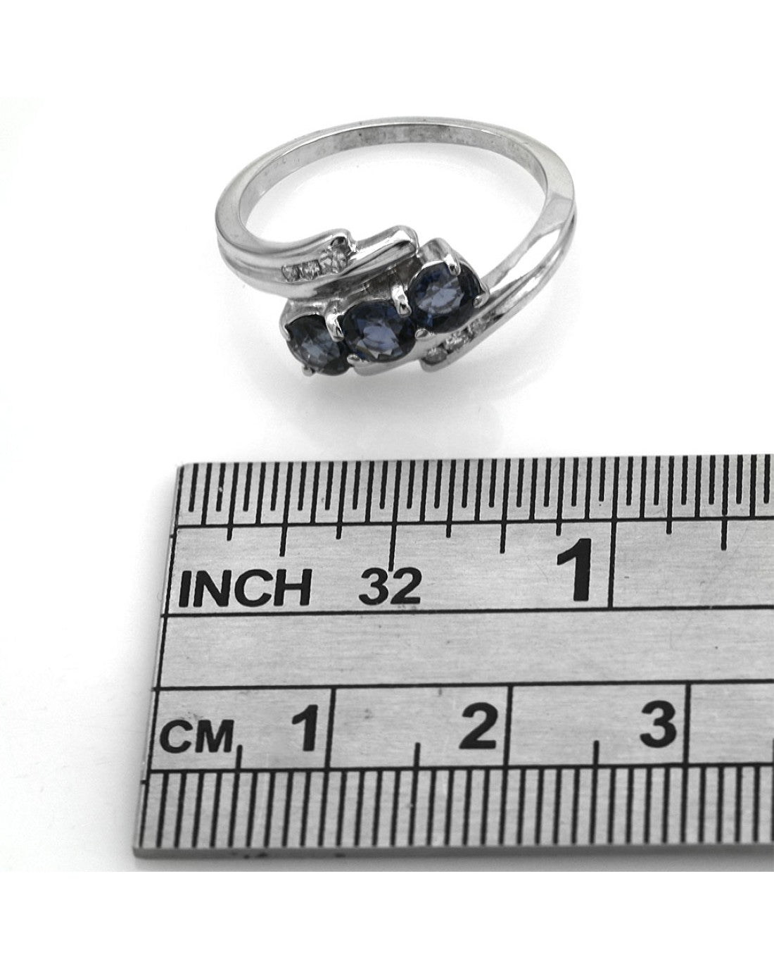 Blue Sapphire and Diamond Bypass Ring in White Gold