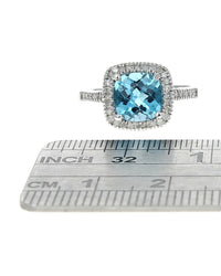 Swiss Blue Topaz and Diamond Halo Ring in White Gold
