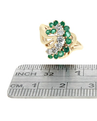 Emerald and Diamond Swirl Ring in Gold