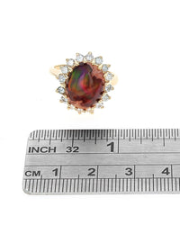 Opal in Rhyolite and Diamond Halo Ring in Yellow Gold