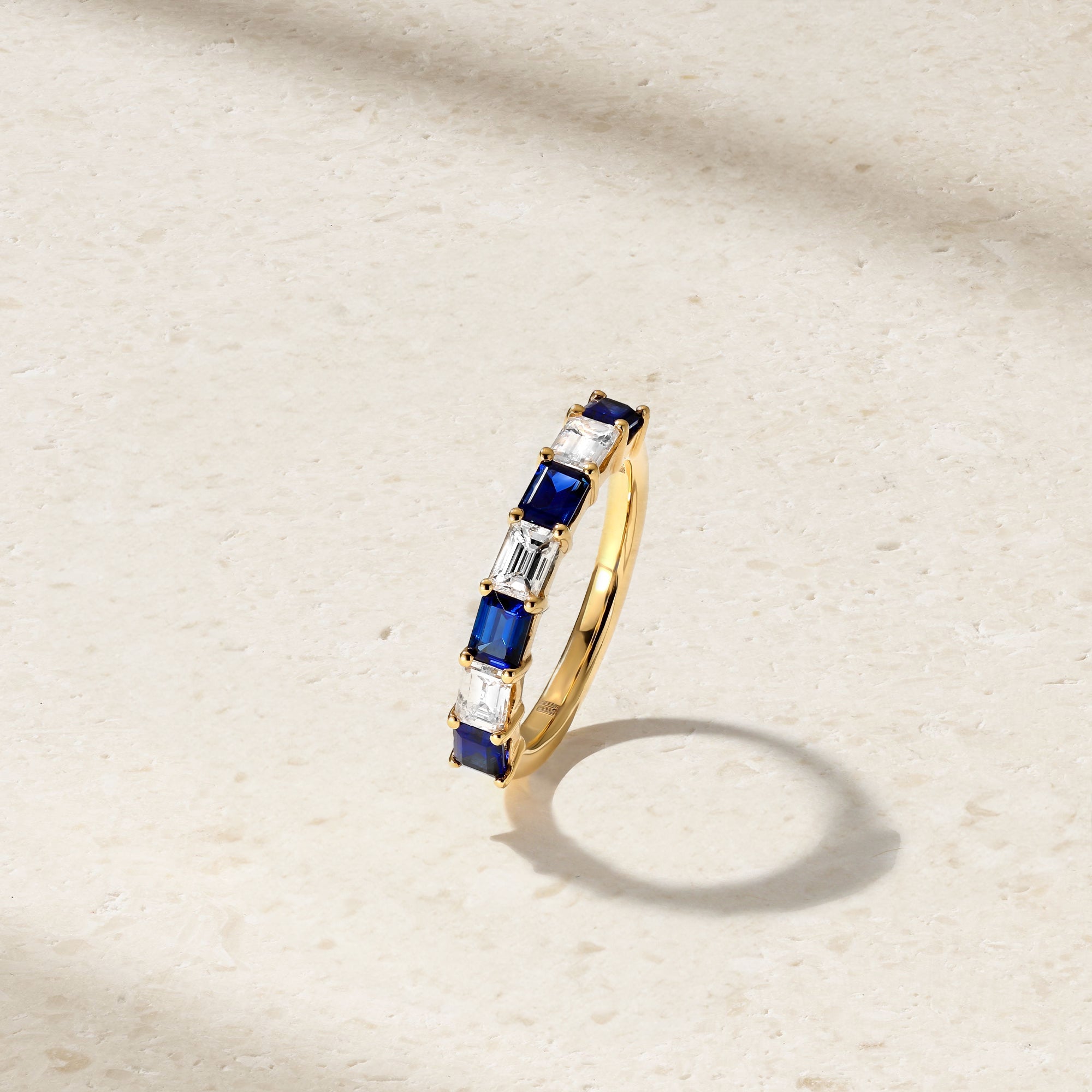 East-West Emerald Cut Sapphire and Diamond Band