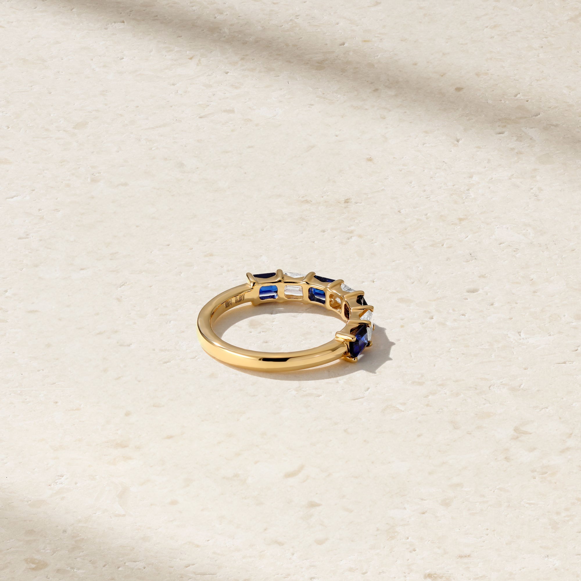 East-West Emerald Cut Sapphire and Diamond Band