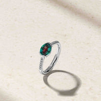 East-West Alexandrite and Diamond Half Bezel Ring