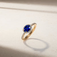 East-West Sapphire and Diamond Halo Ring