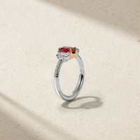 Nouveau Two Tone Three Stone Oval Ruby and Diamond Ring