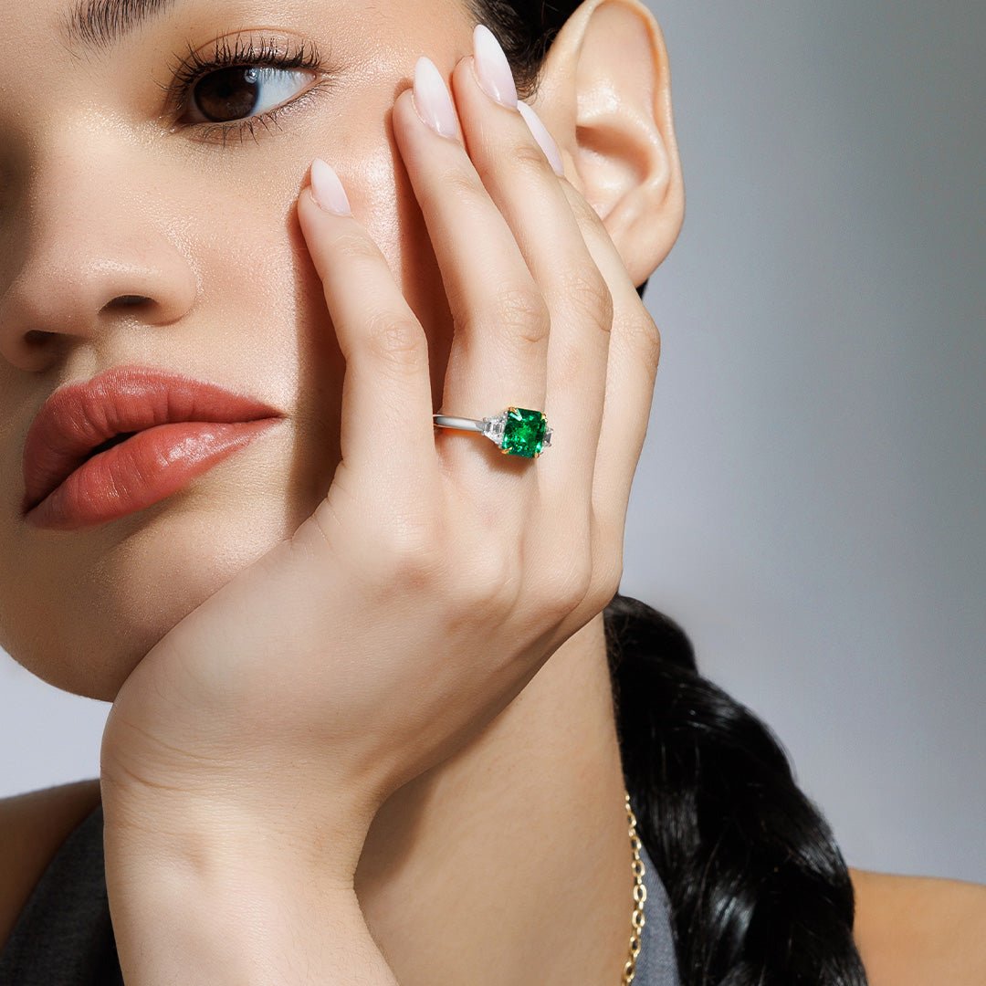 Nouveau Two Tone Three Stone Octagonal Emerald and Diamond Ring