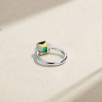 Nouveau Two Tone Three Stone Octagonal Emerald and Diamond Ring
