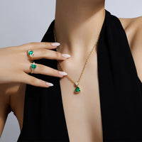 Silky Three Stone Emerald and Diamond Ring