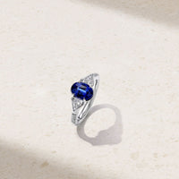 Silky Three Stone Sapphire and Diamond Ring
