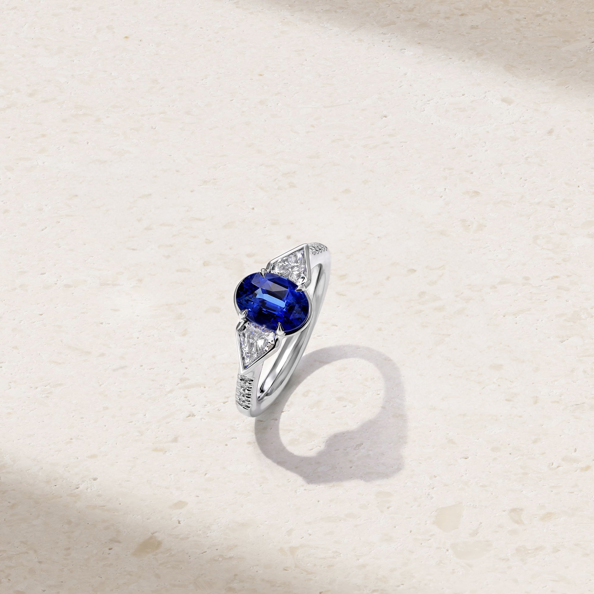 Silky Three Stone Sapphire and Diamond Ring