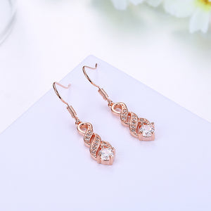 White Topaz Swirl Drop Drop Earring in 18K Rose Gold Plated