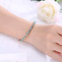 Assymetrical Emerald Cut Swarovski Bangle in 14K Gold - Blue, Bracelet, Golden NYC Jewelry, Golden NYC Jewelry  jewelryjewelry deals, swarovski crystal jewelry, groupon jewelry,, jewelry for mom,