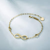 White Austrian Elements Infinite Pendant Chain Bracelet in 14K Gold Plating