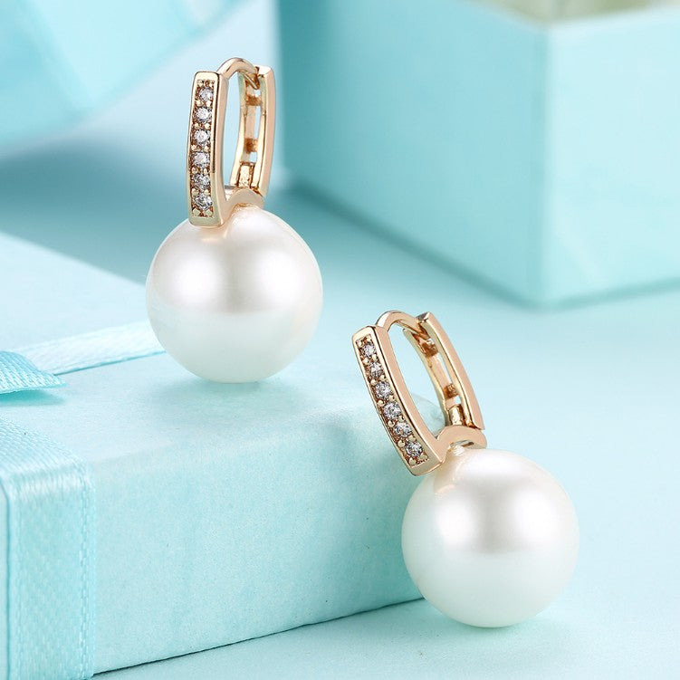 Micro-Pav'e Austrian Crystal Curved Pearl Huggie Earrings Set in 18K Gold - Golden NYC Jewelry