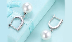 White Austrian Elements Thin Dangling Freshwater Pearl Clip On Earrings in 14K White Gold Plating