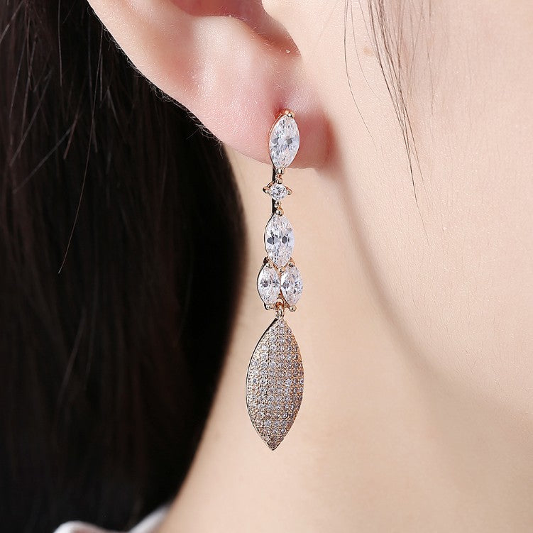 Swarovski Crystal Micro-Pave Dangling Pear Shaped Earrings Set in 18K Gold - Golden NYC Jewelry