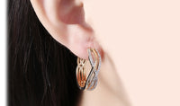 14K Gold Plating White Austrian Elements Twisted Abstract Clip On Earrings