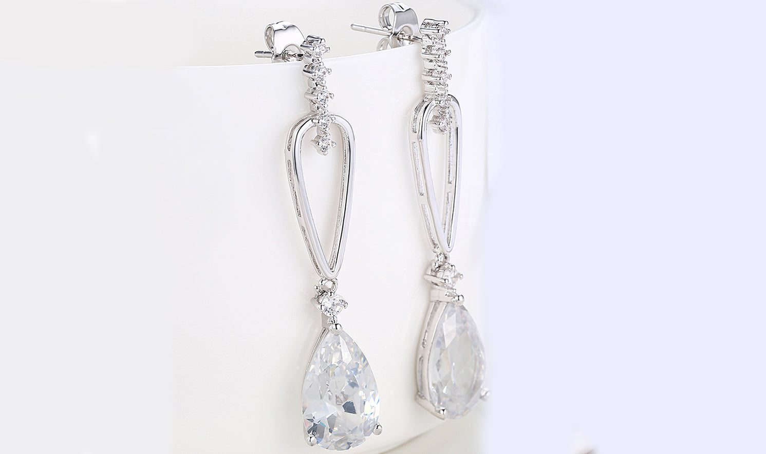 14K White Gold Plating Dangling White Austrian Pear Cut Earrings