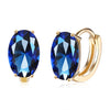 Simulated Sapphire Huggie Earrings Set in 18K Gold - Golden NYC Jewelry