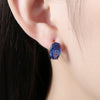 Simulated Sapphire Huggie Earrings Set in 18K Gold - Golden NYC Jewelry